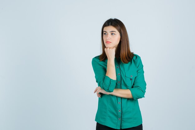 Expressive young woman posing in the studio