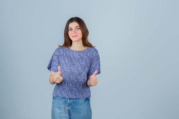 Expressive young woman posing in the studio