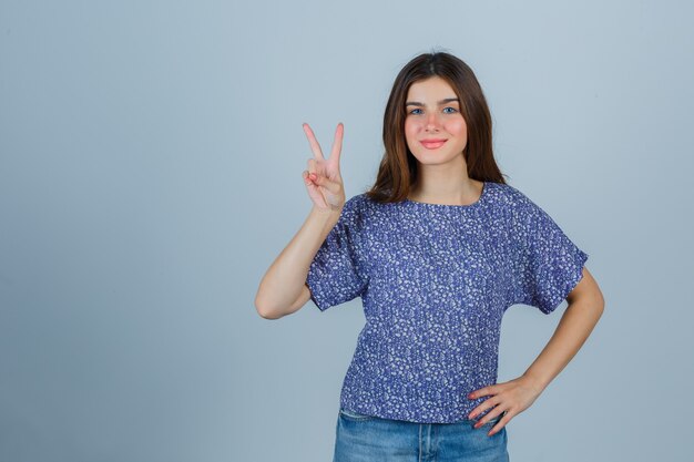 Expressive young woman posing in the studio