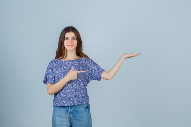 Expressive young woman posing in the studio