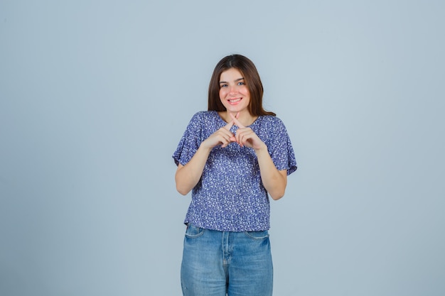 Expressive young woman posing in the studio