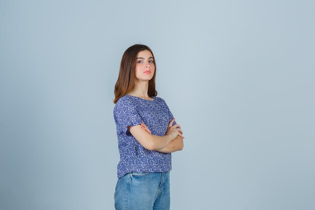 Expressive young woman posing in the studio