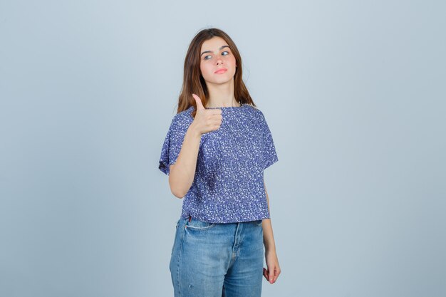 Expressive young woman posing in the studio