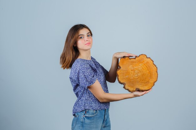 Expressive young woman posing in the studio