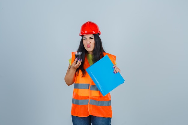 Expressive young woman posing in the studio