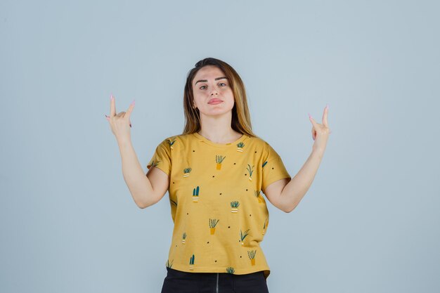 Expressive young woman posing in the studio