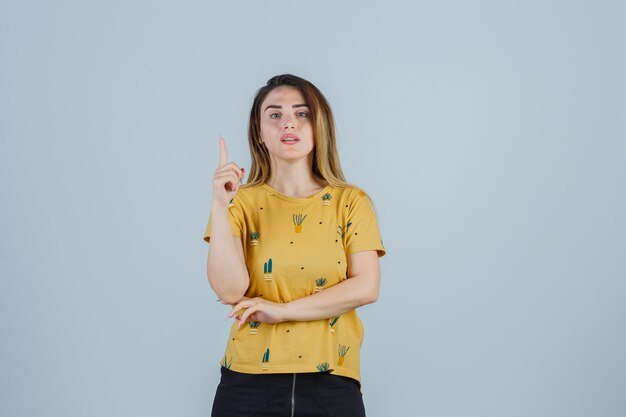 Expressive young woman posing in the studio