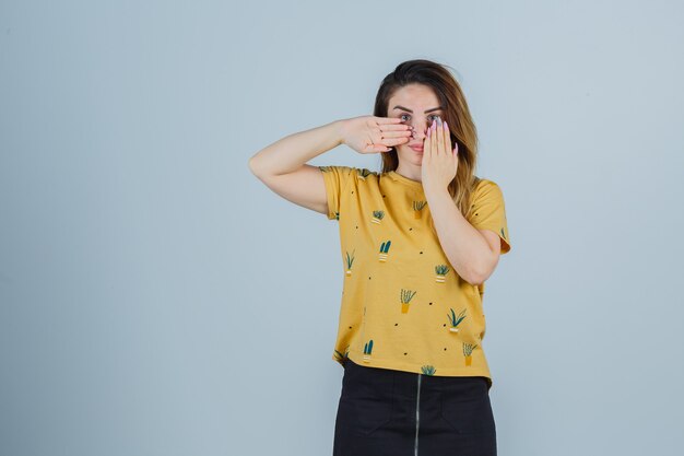 Expressive young woman posing in the studio