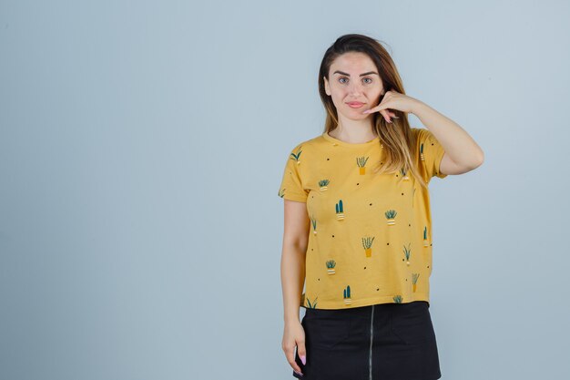 Expressive young woman posing in the studio