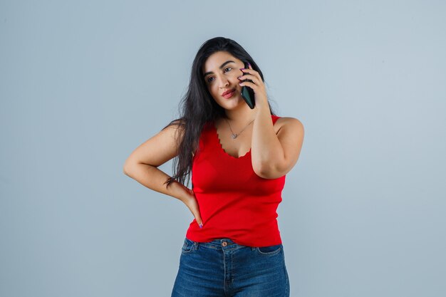 Expressive young woman posing in the studio