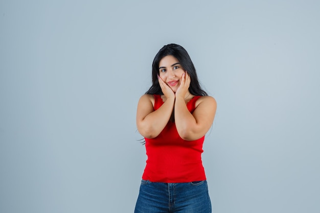 Expressive young woman posing in the studio