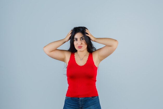 Expressive young woman posing in the studio