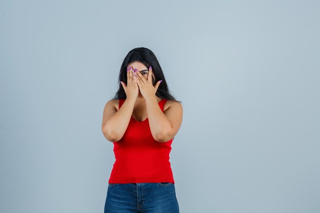 Expressive young woman posing in the studio