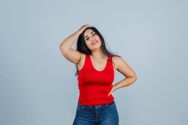 Expressive young woman posing in the studio