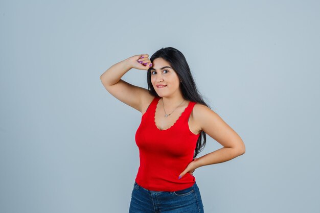 Expressive young woman posing in the studio