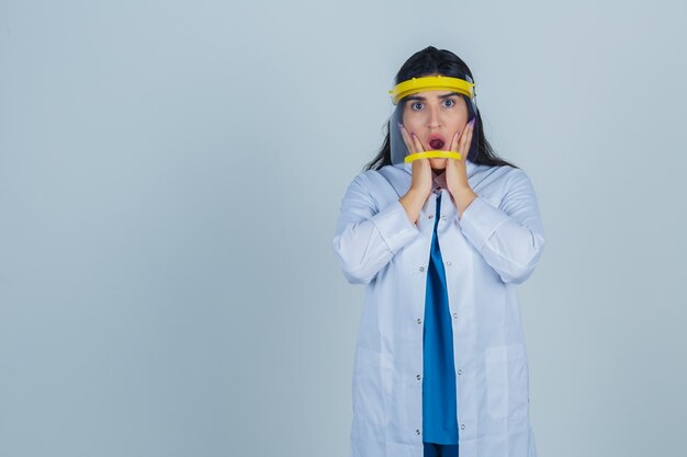 Expressive young woman posing in the studio