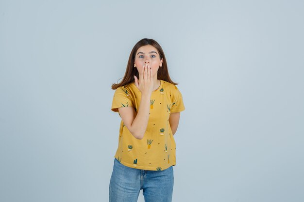 Expressive young woman posing in the studio