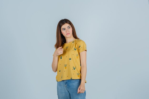 Expressive young woman posing in the studio