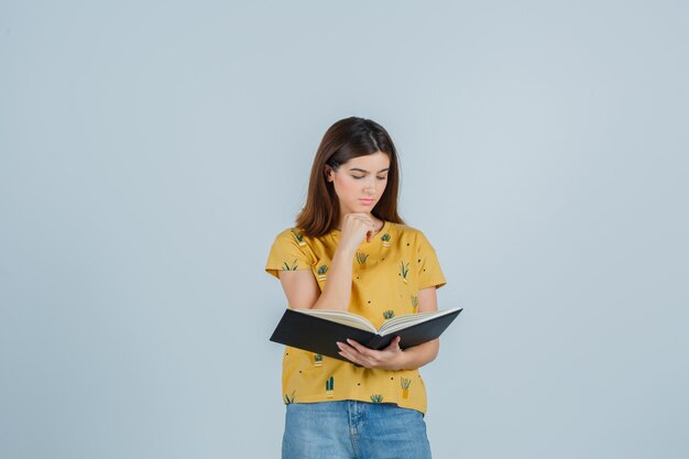 Expressive young woman posing in the studio