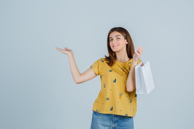 Expressive young woman posing in the studio