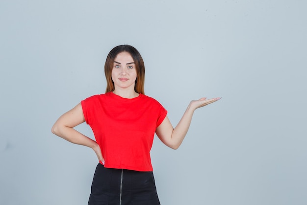 Expressive young woman posing in the studio