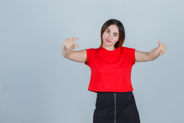 Expressive young woman posing in the studio