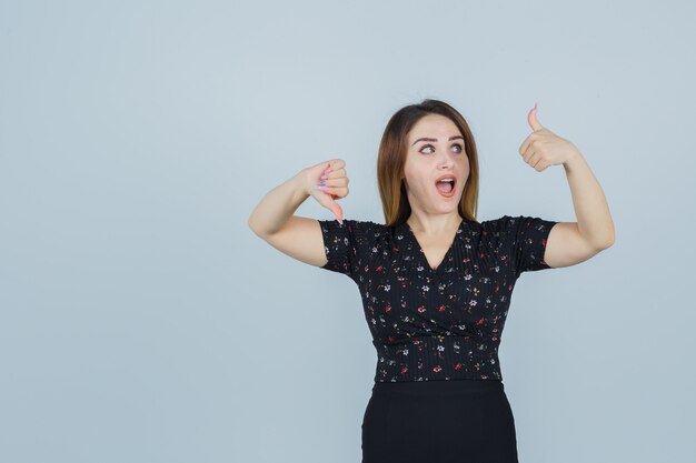 Expressive young woman posing in the studio