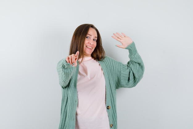 Expressive young woman posing in the studio