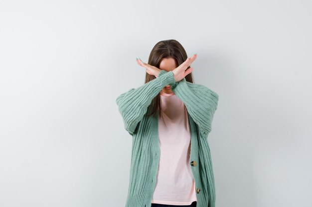 Expressive young woman posing in the studio