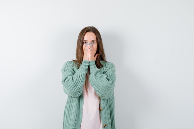 Expressive young woman posing in the studio