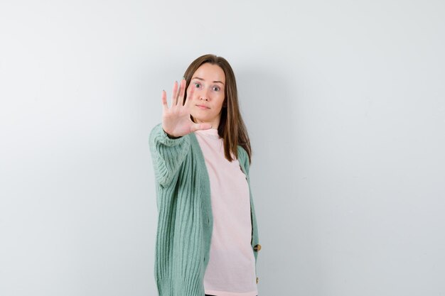 Expressive young woman posing in the studio