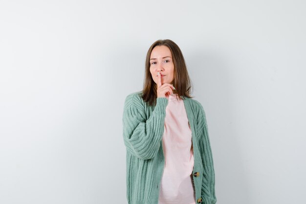 Expressive young woman posing in the studio