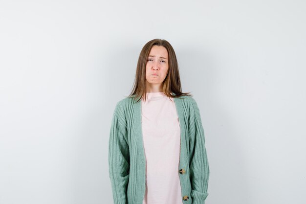 Expressive young woman posing in the studio