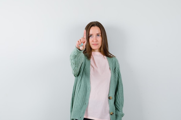 Expressive young woman posing in the studio