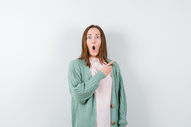 Expressive young woman posing in the studio