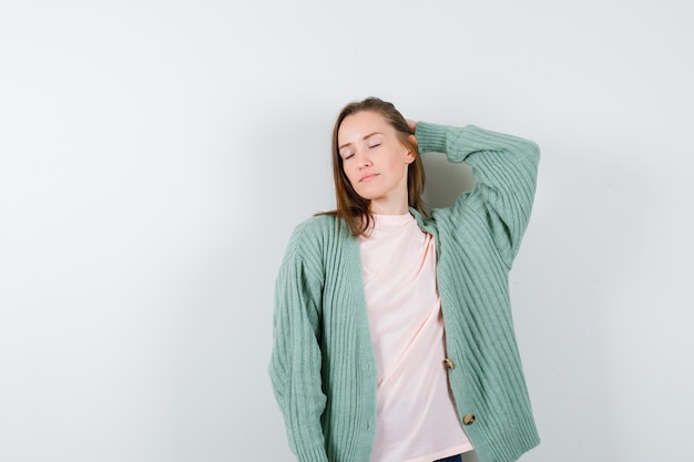 Expressive young woman posing in the studio