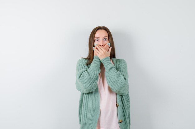 Expressive young woman posing in the studio