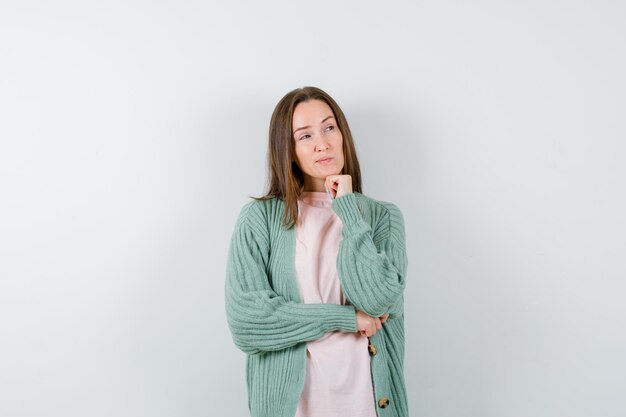 Expressive young woman posing in the studio