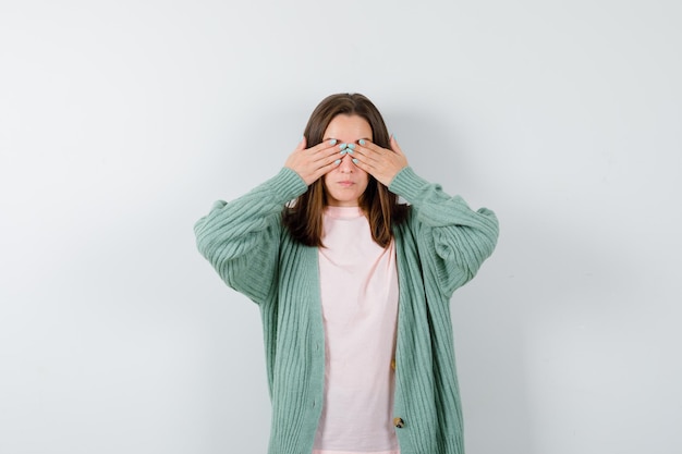 Expressive young woman posing in the studio