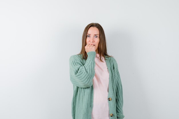 Expressive young woman posing in the studio