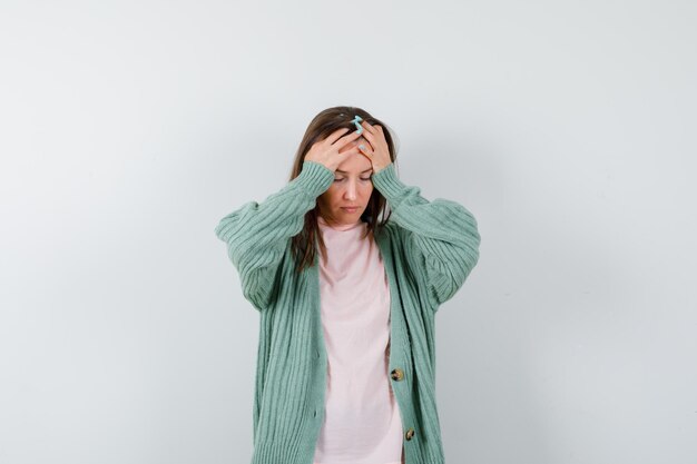 Expressive young woman posing in the studio