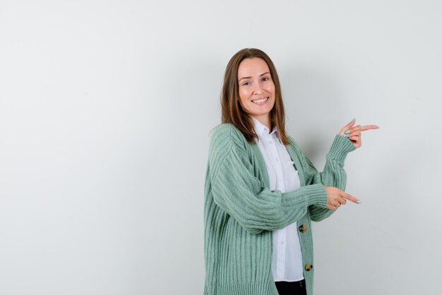 Expressive young woman posing in the studio