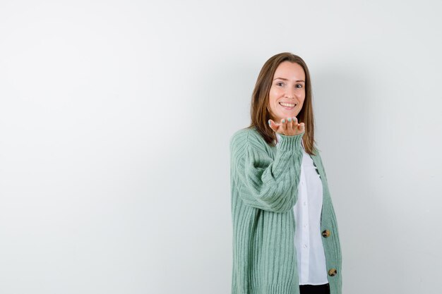 Expressive young woman posing in the studio