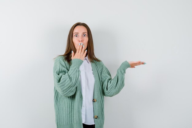 Expressive young woman posing in the studio