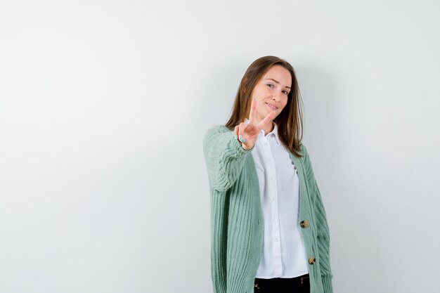 Expressive young woman posing in the studio