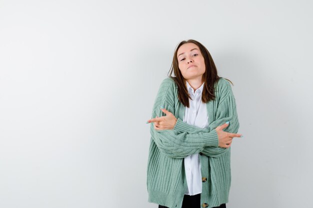 Expressive young woman posing in the studio