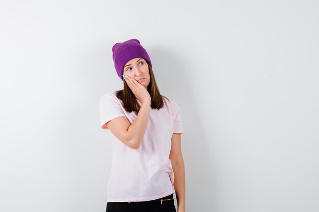 Expressive young woman posing in the studio