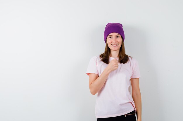 Expressive young woman posing in the studio