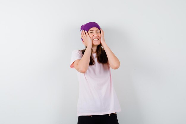 Expressive young woman posing in the studio