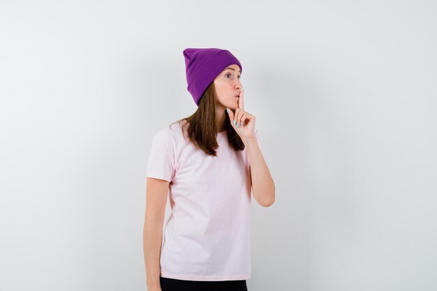 Expressive young woman posing in the studio